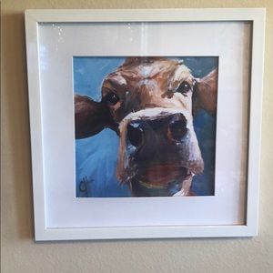 Frames and matted cow themed wall art